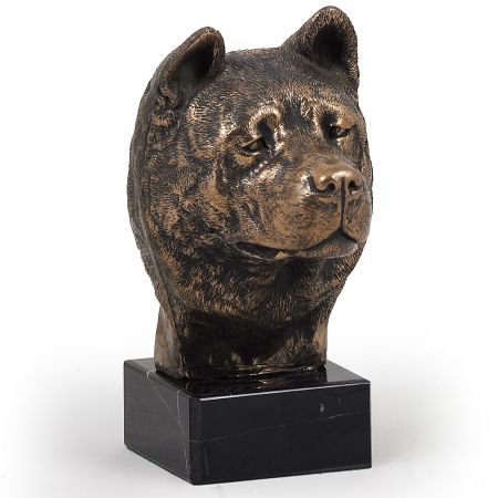 Akita inu statue on marble base