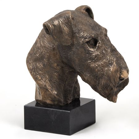Airedale Terrier statue on marble base
