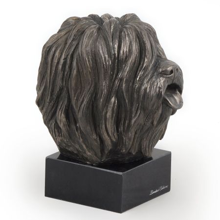 Polish Lowland Sheepdog statue on marble base