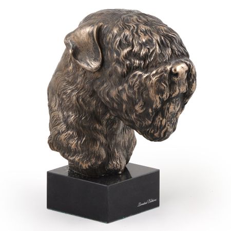 Black Russian Terrier statue on marble base