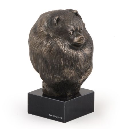 Pomeranian statue on marble base